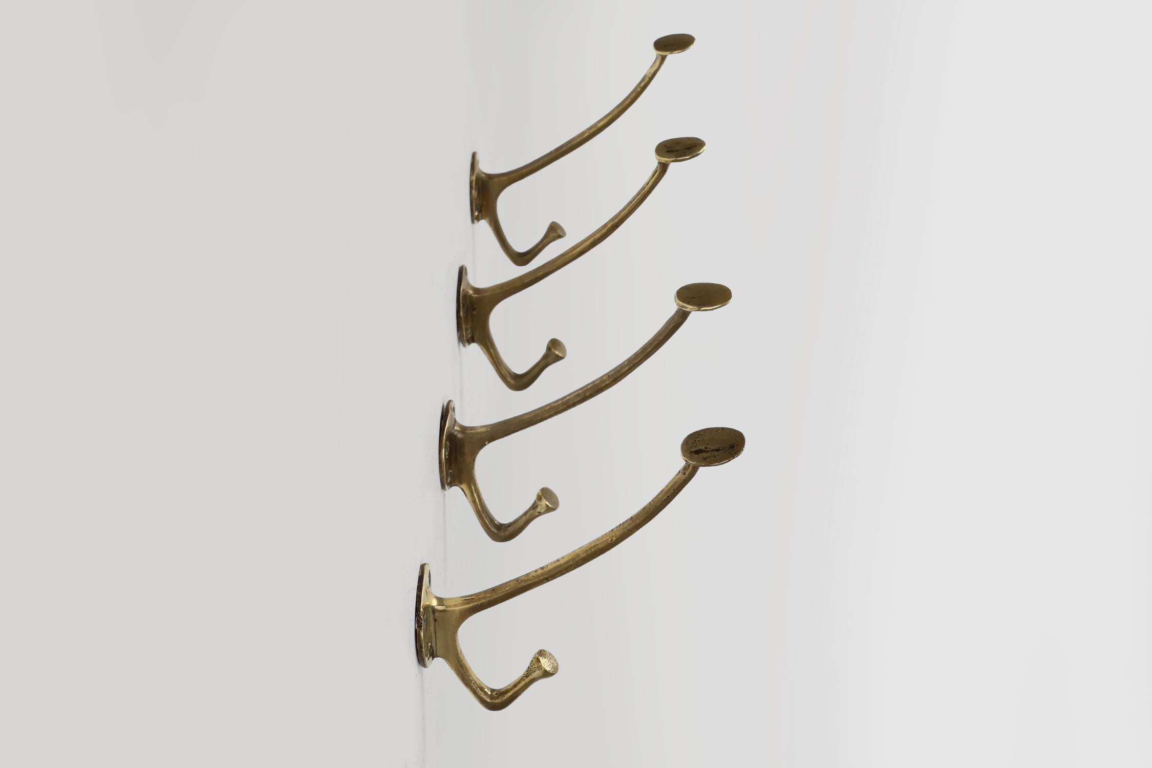 Set of 4 Adolf Loos brass art nouveau wall hooks, Vienna, Austria ca. 1910thumbnail